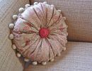 round shirred pillow with button