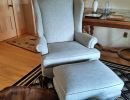 blue textured wing chair and ottoman