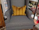 gold pillow blue chair
