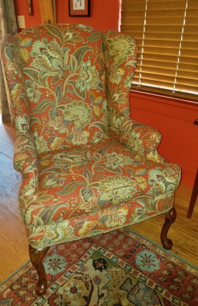 red floral wing chair